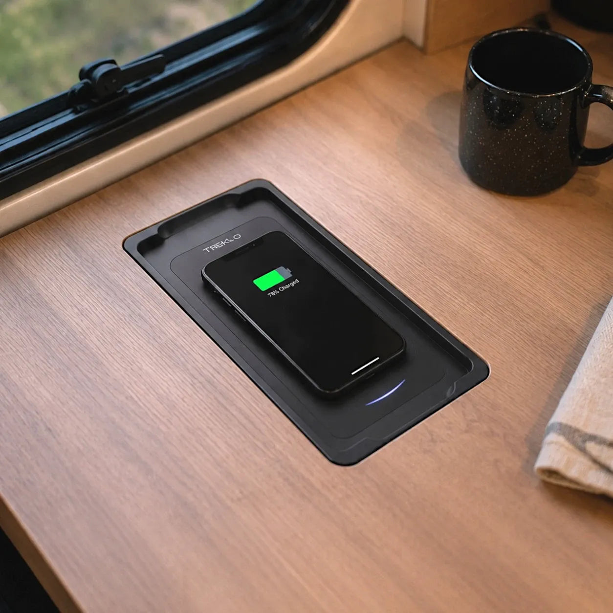 Wireless phone charger for caravan and campervan interiors