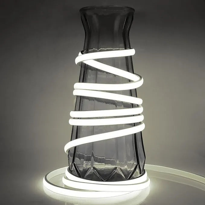 cool white neon diffuser strip arranged beside tools