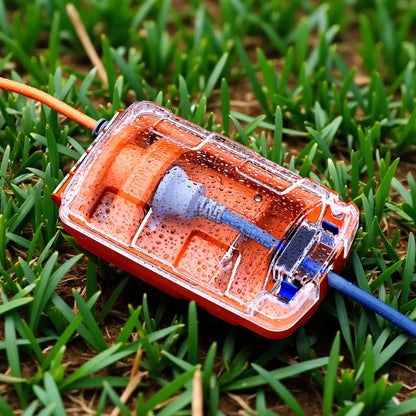 A 10-15 Amp Adapter displayed on grass.