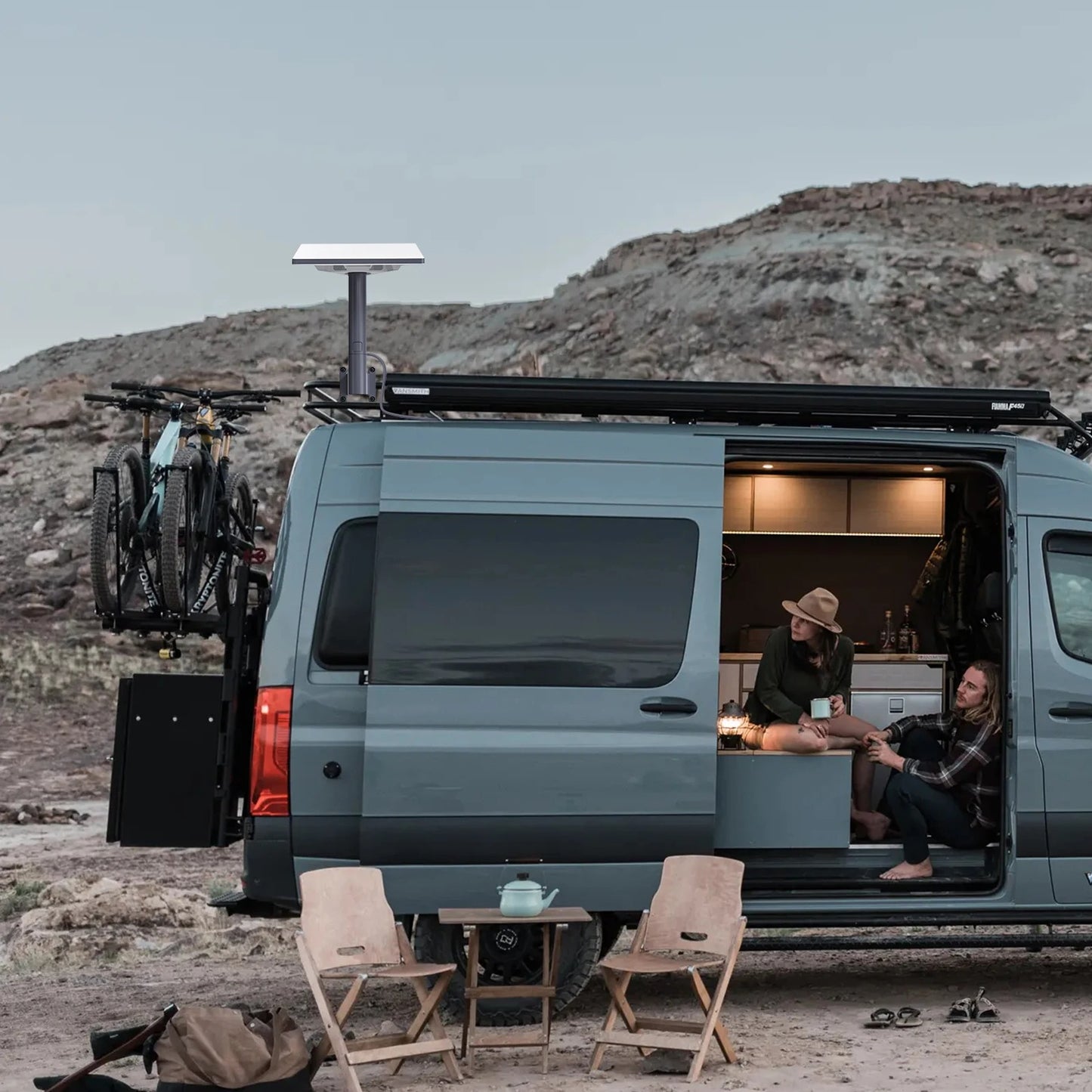 Starlink Mini pole clamp mount installed on campervan roof rail