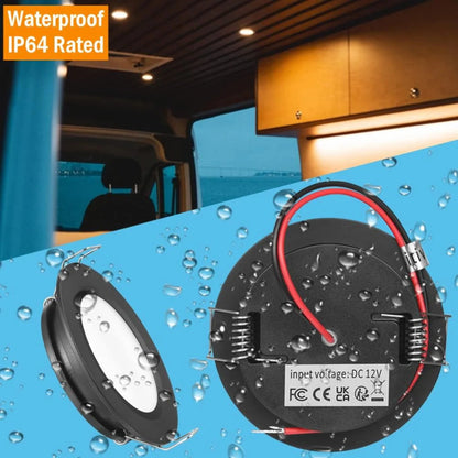 four black LED downlights arranged together