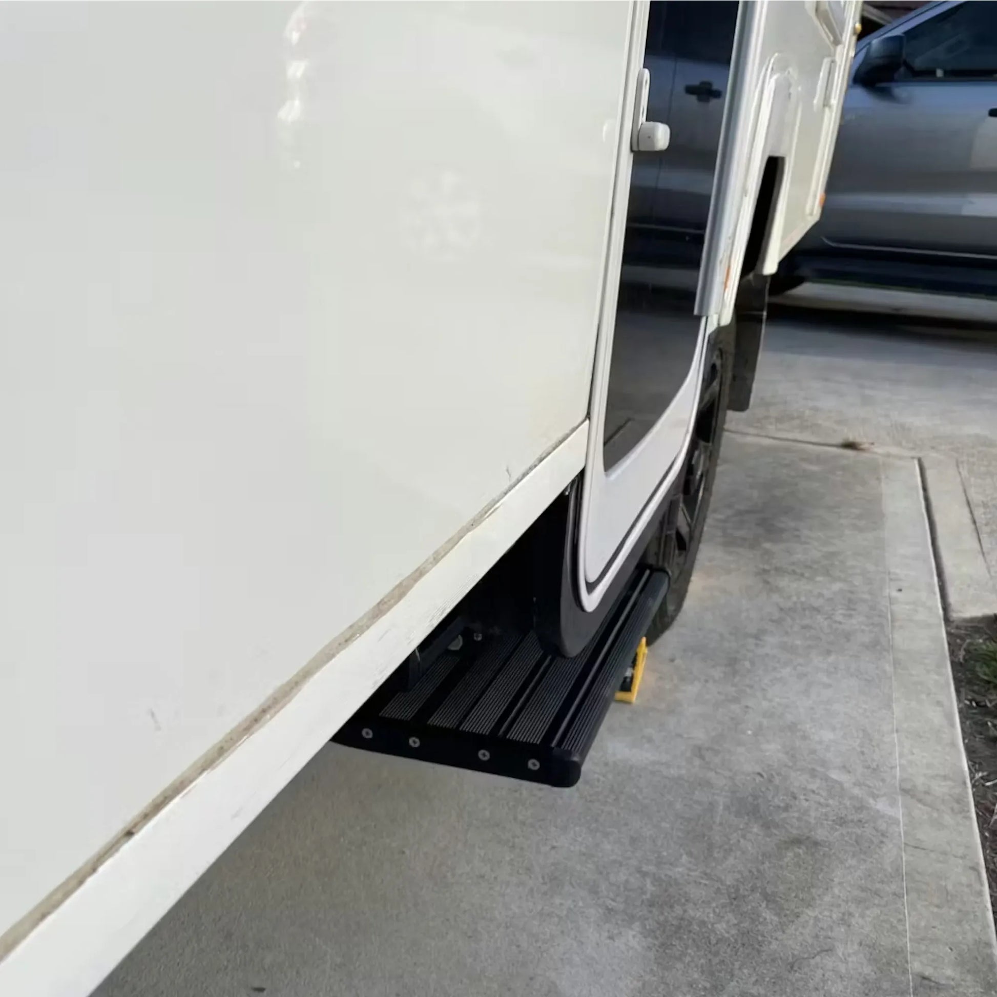 Manual folding caravan step black finish for easy vehicle entry