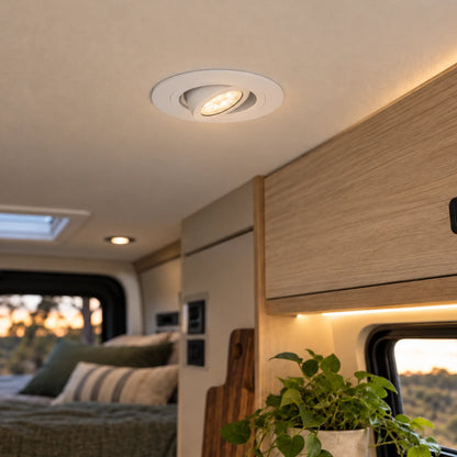Two Treklo white campervan downlights providing crisp cool white interior illumination
